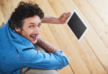 Poster - Portrait, man and tablet screen on couch for relax, online and streaming in living room. Happy, technology and internet for games, social media and connection or communication in home or apartment