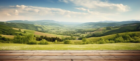 Aufkleber - Scenic countryside view of rolling hills and valleys with a wooden plank floor beneath the copy space image.