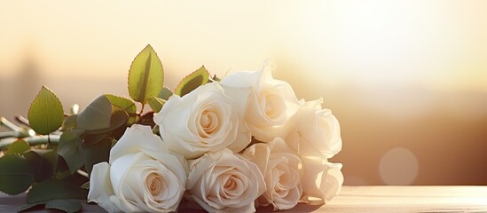 Aufkleber - A beautiful bouquet of white roses illuminated by the morning sun in a copy space image.