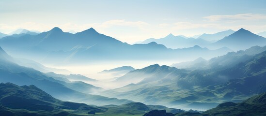 Poster - Scenic view of fog-covered mountain hills and sea in the morning with a copy space image.