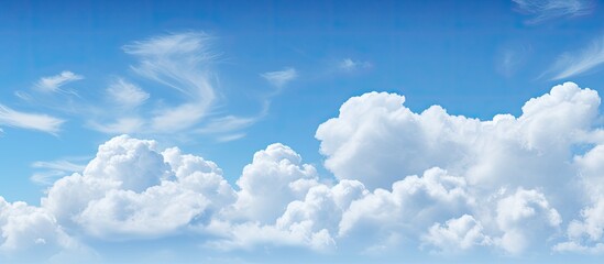 Aufkleber - Soft focus white clouds against a blue sky background with copy space image.