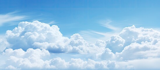 Aufkleber - White soft clouds floating gracefully in the clear blue sky, creating a serene backdrop suitable for a copy space image.