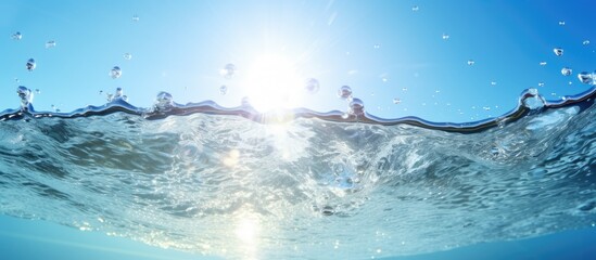 Poster - Sprinkling water under the bright sun with a copy space image.