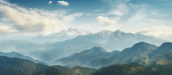 Poster - Scenic mountain vista captured while hiking, showing a breathtaking high-altitude view of the landscape with copy space image potential.