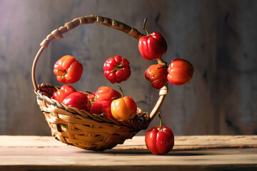 Wall Mural - acerola fuits on a wooden table