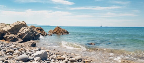 Poster - Seaside landscape with rocks on shore, perfect for a copy space image.