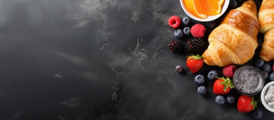 Poster - Sweet breakfast butter croissants with coffee cup orange jam and fresh summer berries Traditional continental breakfast with croissants concept grey stone background copy space