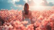 © Yuliia - A woman in a white dress standing on a blossom pink flower field, creating a freedom, happiness and dreamy atmosphere.
