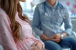 © Michael - Pregnant woman at a doctor's appointment in a antenatal clinic