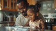 © ismel leal - Padre e hija afroamericano en la cocina haciendo tareas del hogar.
