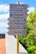 © Pedro Emanuel  - Wooden direction signs with various information on tourist points of interest, cycle path, fishing spot, campsite, cycle path, restaurant, windmills. São Jorge Island-Azores-Portugal