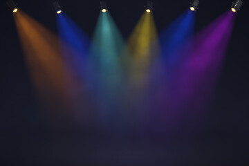 Wall Mural - multi-colored light and smoke on the theater stage.