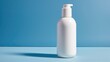 © sitifatimah - Plain white cosmetic bottle with a blue background, emphasizing cleanliness and simplicity