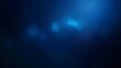 © Tida - Abstract blue background with bokeh lights - Abstract image with blue gradient background and bokeh light effects, suitable for elegant backdrops