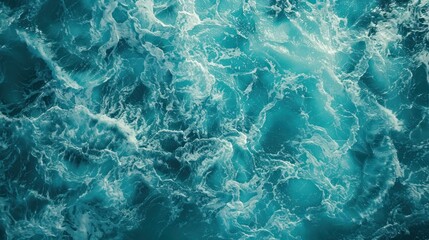 Turquoise foam surface of the blue sea with waves The water surface is blue foam.