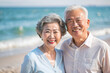 © Pixel Perfect PNGs - ビーチで微笑む日本のアジア人シニアカップル