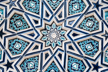 Wall Mural - ceramic tile Uzbek mosaic with oriental Arabic Islamic pattern decorated with blue and white floral ornament with stars