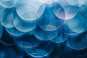 Poster - Glass circles with gradients from light blue to deep navy, layered and reflecting softly in an abstract design,
