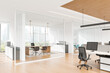 © ImageFlow - Modern office interior with sleek furniture and glass partitions, light wooden floor design, bright setup and large windows, concept of contemporary workspace.  3D Rendering