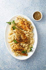 Wall Mural - Baked chicken fillet with quinoa and herbs