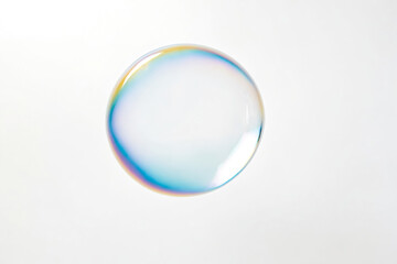 Poster - Single iridescent soap bubble on a white background