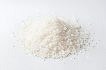 Wall Mural - Pile of White Rice Grains on White Background