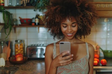 Poster - Happy lady using phone in kitchen