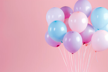 A bunch of pastel colors balloons on the pink  background. Birthday balloons.  Celebration balloons.