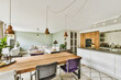© ADDICTIVE STOCK - Modern open-plan kitchen and living room interior design