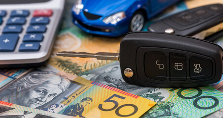 Wall Mural - On Australian dollars there are car, keys and calculator