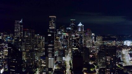 Wall Mural - Mesmerizing 4K Drone Shot: Aerial Night Shot of Belltown and Downtown Seattle
