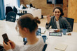© Daria - Group of female managers sitting in open office while working on digital tablet and laptop