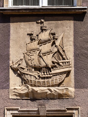 Wall Mural - Beautiful wall stucco decorations with vintage ship on the wall in Gdansk