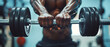 © Inlovehem - Close-up of a muscular person lifting weights in a gym, focusing on the barbell and the determination to build strength and muscle.