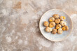 © zgurski1980 - Grape (Burgundy) snails with butter and cheese on brown concrete, top view, copy space.