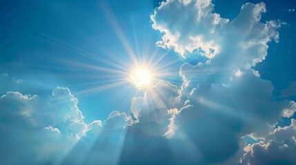 Wall Mural - clouds in the sky with the sun and sunlight sending out beams of light
