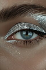 Wall Mural - closeup shot of woman eye iris and creative silver makeup with dye and paint, macro of cosmetics makeup, beauty and fashion