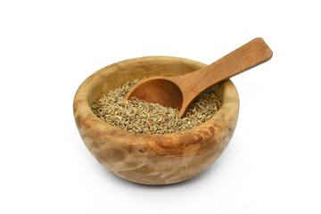 Wall Mural - anise seeds seasoning in a wooden bowl isolated on white.