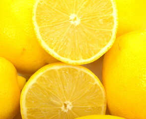 Wall Mural - Ripe lemons isolated on white