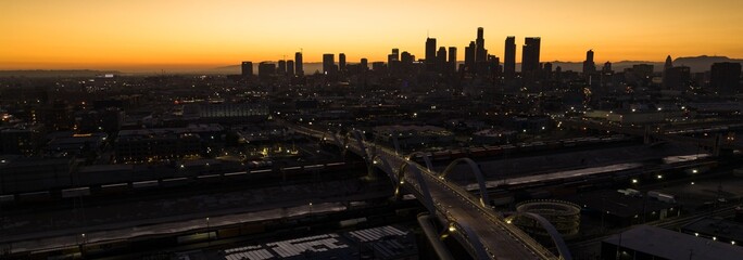 Wall Mural - Mesmerizing 4K Drone Shot at dusk: Sixth Street Viaduct - Aerial View Connecting Downtown LA Arts District to Boyle Heights
