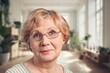 © BillionPhotos.com - Indoor portrait of serious mature woman posing