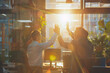 © Nate - In the bustling modern office, smiling coworkers jubilantly exchange high fives, their hands raised in celebration of a successful business project