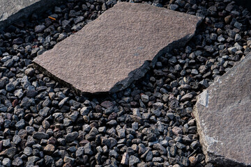 Close-up of dark gravel stones