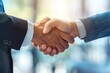 © kitipol - Confident businessmen sealing a deal with a handshake in a contemporary office environment, showcasing success and partnership