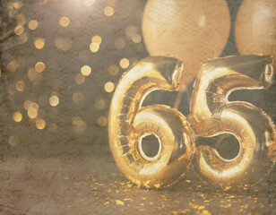 Wall Mural - Number 65 gold foil balloon. Anniversary celebration decoration with golden balloons on bokeh background. Party, birthday, anniversary, celebration concept	