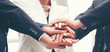© aFotostock - Banner Partners hands together teamwork group of business people meeting in firm company office. Panorama Diversity Hands join empower partner teams connection Mergers acquisitions social community
