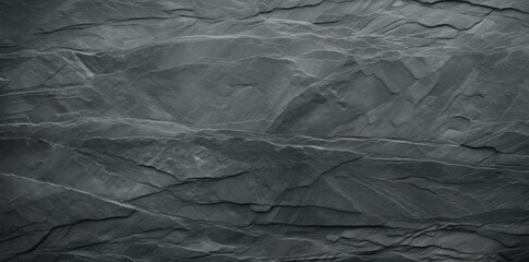 Wall Mural - slate texture as a background a collection of rocks arranged in a row from left to right, with a small rock on the left and a larger rock on the right