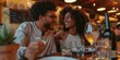 © Iryna - Young friends in love celebrating togetherness, drinking wine and smiling, enjoying a romantic evening at a cafe.