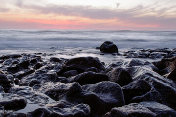 Wall Mural - Rocky coast at sunset