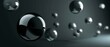 © antkevyv - Group black spheres floating in dark void, art ball float chrome